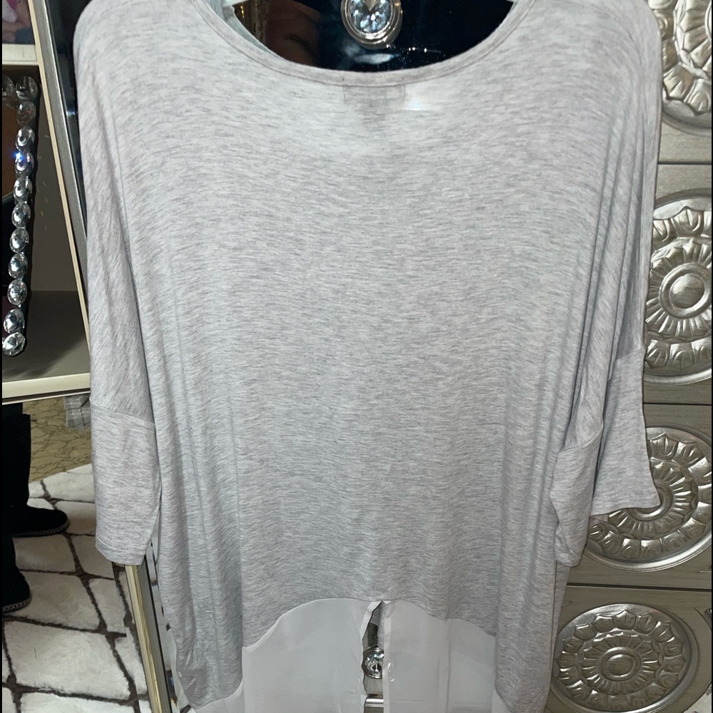 Woman’s shirt with sheer material